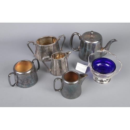 82 - A quantity of silver plate including jugs and teapot.