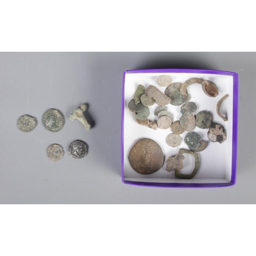 84 - A collection of metal detector finds including possible Roman coin examples.