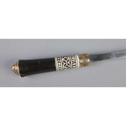 429 - An Indian ebony sword stick featuring carved bone decoration and tigers head on hilt. CAN NOT POST O... 