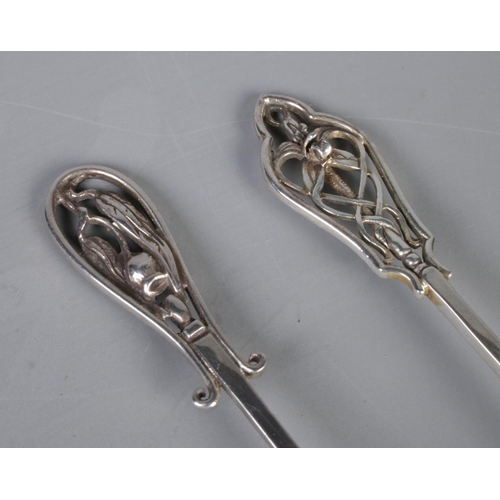 448 - Two silver Arts & Crafts style spoons. Total weight: 29.3g