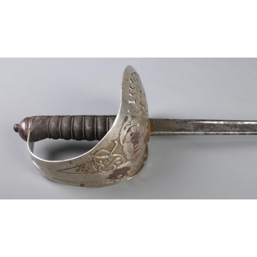 458 - A George VI Royal Marines presentation sword, in leather case. With shagreen handle, pierced GR VI g... 