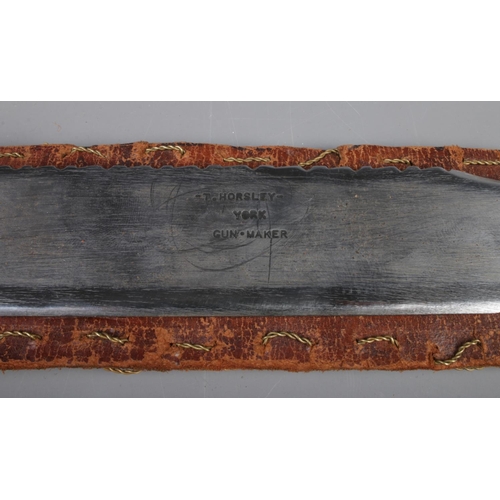 459 - A bowie knife, in leather sheath with Bayard handle and blade stamped for 'Smith, York' and 'T.Horsl... 