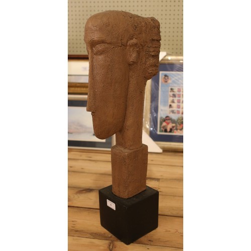 4 - A large pottery bust. Raised on square formed base. (64cm)