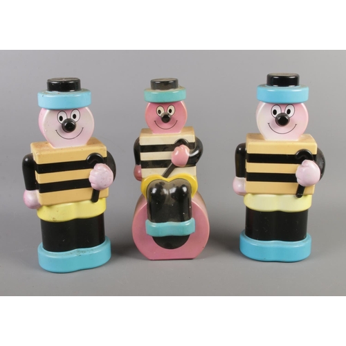 11 - Three Bertie Bassett Liquorice Allsorts money boxes.