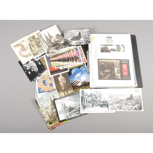 203 - A collection of replica German postcards, together with a folder on the Norwegian 'Operation Freshma... 