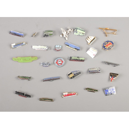 204 - A collection of transport pin badges including Triumph, Ticket Collector, Flying Scotsman, S.T.A Sch... 