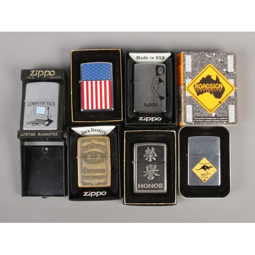 211 - Six boxed vintage Zippo lighters, some used including Jack Daniels, Australian Kangaroo Road Sign, A... 