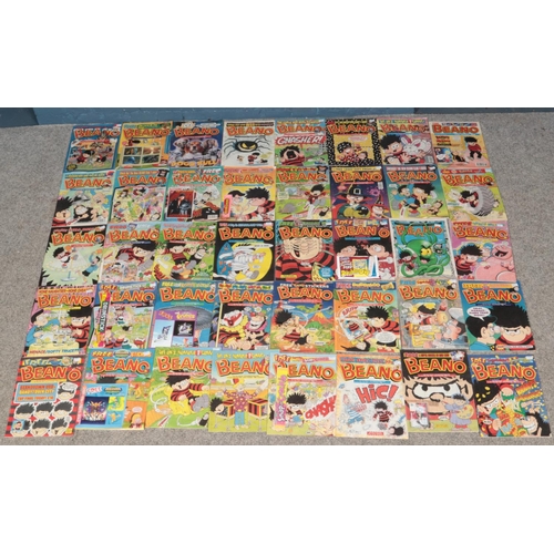 331 - A large quantity of Beano magazine. Including 1970s, 80s and 90s examples. Some with original free g... 