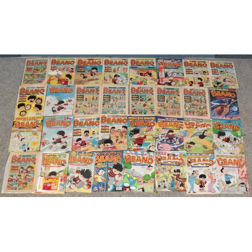 331 - A large quantity of Beano magazine. Including 1970s, 80s and 90s examples. Some with original free g... 