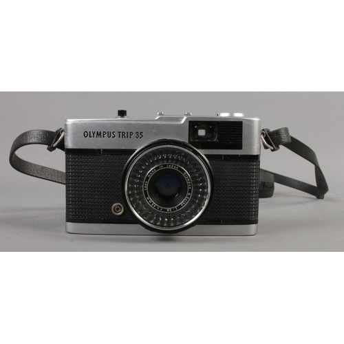 33 - A small quantity of collectables, including Olympus Trip 35 camera in case, a collection of twentiet... 