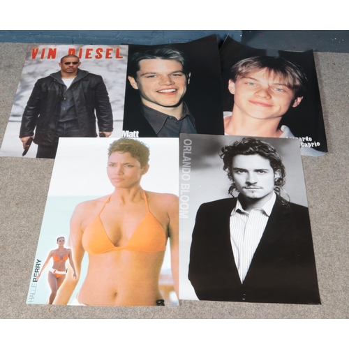 384 - A quantity of mostly film star posters. Including Vin Diesel, Matt Damon, Brad Pitt, etc. Approximat... 