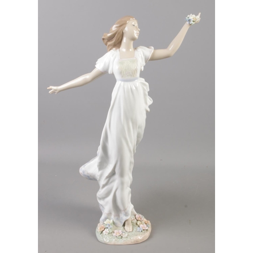 49 - A large Lladro figure of a dancing maiden. Height 42cm.