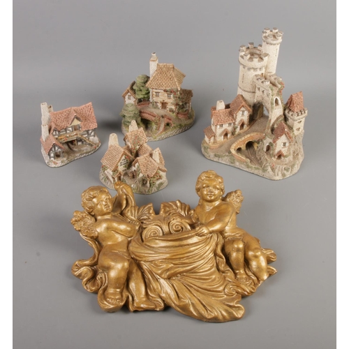 53 - A quantity of David Winter figures including Tollkeepers Cottage and The Bothy also a gilt cherub wa... 