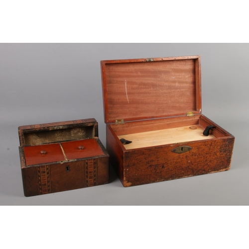 63 - A Victorian mahogany tea caddy, together with a mahogany box with three removable trays. Box stamped... 