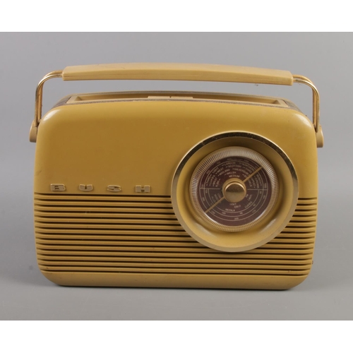 8 - A Bush 'Antique' radio in cream. Power cord missing.