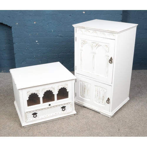 532 - Two painted hardwood entertainment storage units. Featuring hinged top, semi-fitted interior and gla... 