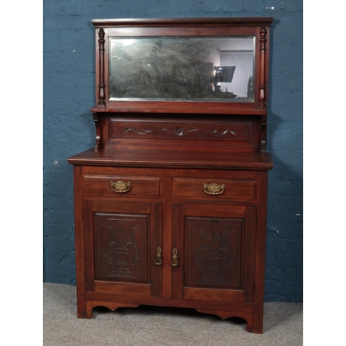 546 - A Victorian carved mahogany mirror back sideboard.