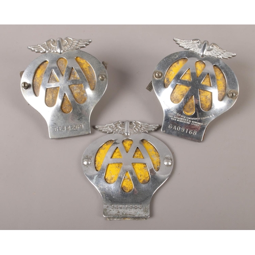 114 - Three AA enamel car badges, with screw backs.