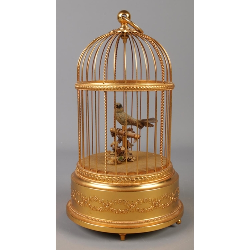 1 - A late Twentieth Century Reuge Music Swiss clockwork bird in cage automation. Stamped underneath Sai... 