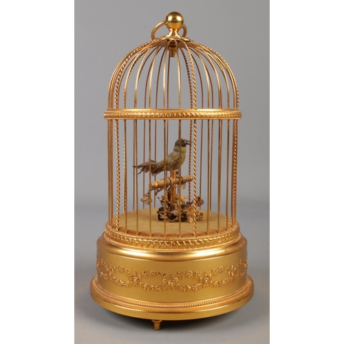 1 - A late Twentieth Century Reuge Music Swiss clockwork bird in cage automation. Stamped underneath Sai... 