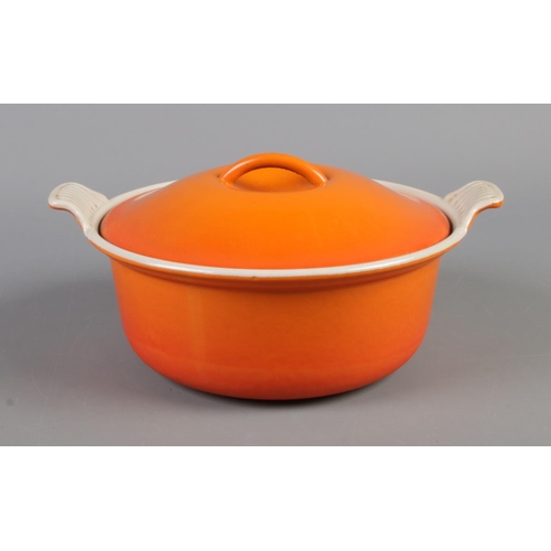 19 - An orange Cousances casserole cooking pot.