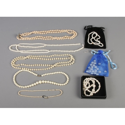 24 - A collection of simulated pearl necklaces, bracelets and earrings.