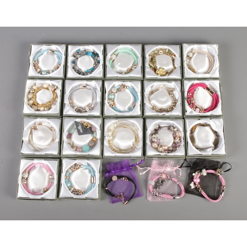 36 - A quantity of costume jewellery bracelets, most boxed. Several bearing M&S stamp to closure. 20 tota... 