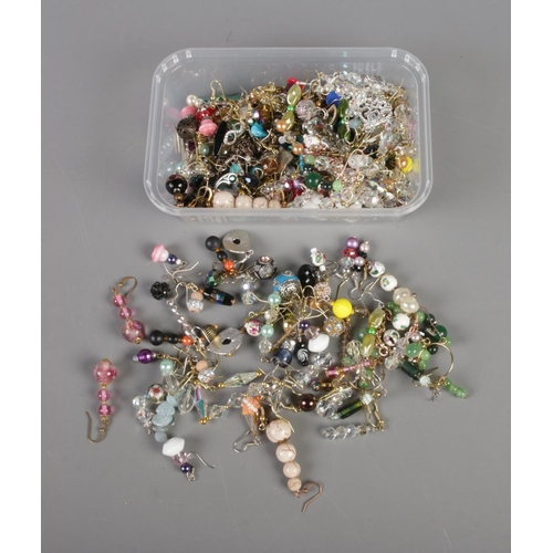 55 - An extremely large quantity of beaded costume jewellery earrings. Some glass examples also included.