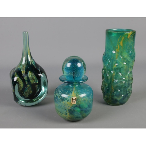 6 - Three pieces of Mdina glassware, to include nobbly cylindrical vase and narrow neck bud vase. Signed... 