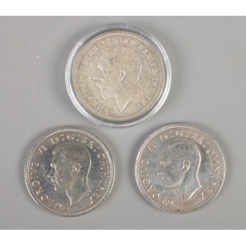 405 - A George V 1935 crown (28.3g), together with two George VI 1937 crowns (28.2g and 28.4g.