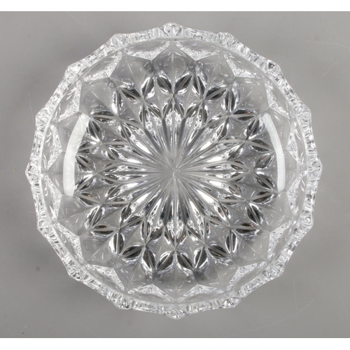 99 - A set of twelve cut glass circular trays.