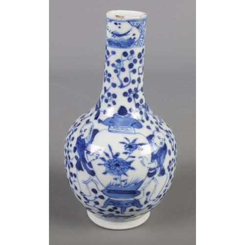 3 - A 19th century Chinese vase. Decorated in underglaze blue with Immortals and cherry blossom. Bearing... 