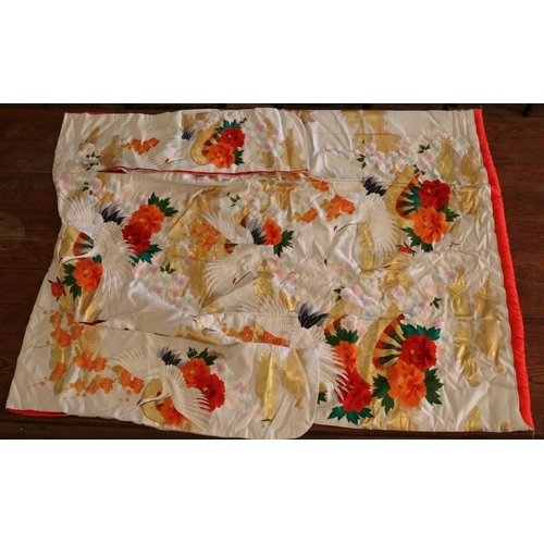 273 - A Japanese wedding Kimono. Decorated with hand embroided cranes and flowers.