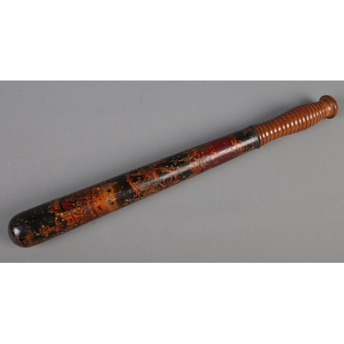 481 - A Victorian painted police truncheon. Baring the Royal Cyper Crown and Constable panel. (43cm)