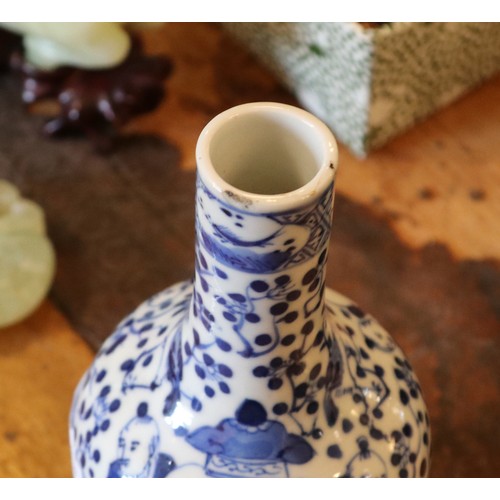 3 - A 19th century Chinese vase. Decorated in underglaze blue with Immortals and cherry blossom. Bearing... 