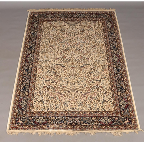 122 - An ivory ground full pile Kashmir rug with Tree of Life design. 230cm x 157m.