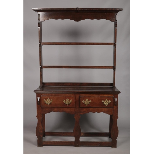 133 - A Georgian style oak pot board dresser. Height 174cm, Width 106cm, Depth 41cm.