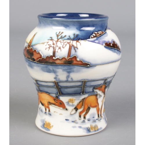 25 - A small Moorcroft baluster shaped vase by Anji Davenport. Decorated in the 'Woodside Farm' pattern, ... 