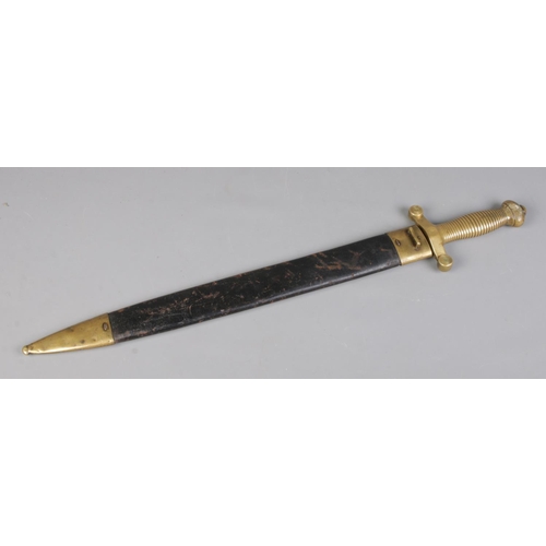 55 - A French 1831 model short sword with brass and leather scabbard. Bearing anchor mark to cross guard,... 