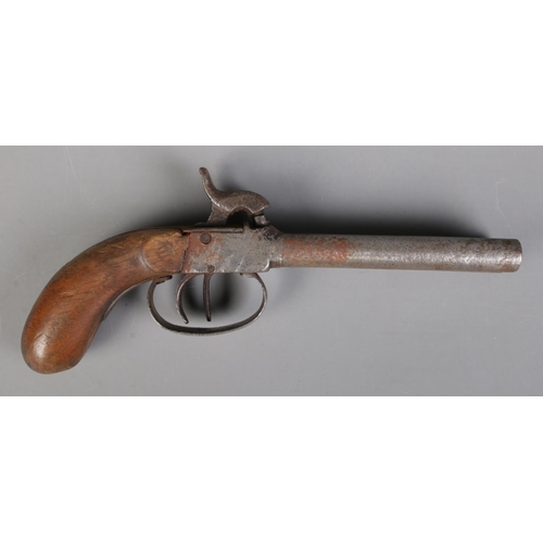 61 - A 19th century double barrel percussion cap pistol. Length 21.5cm. CANNOT POST OVERSEAS