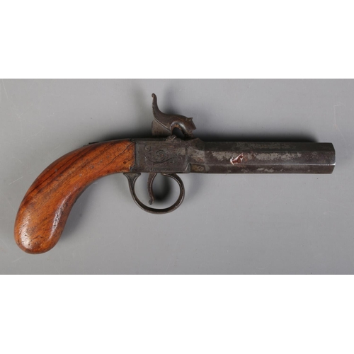 63 - A 19th century percussion cap pistol with octagonal barrel. Bearing Birmingham proof marks. Length 1... 