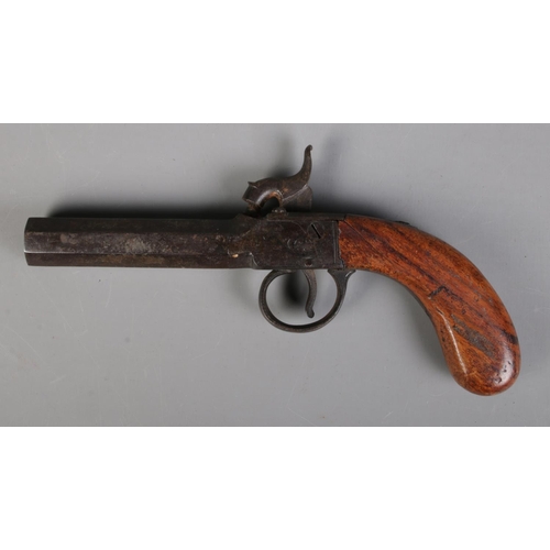 63 - A 19th century percussion cap pistol with octagonal barrel. Bearing Birmingham proof marks. Length 1... 