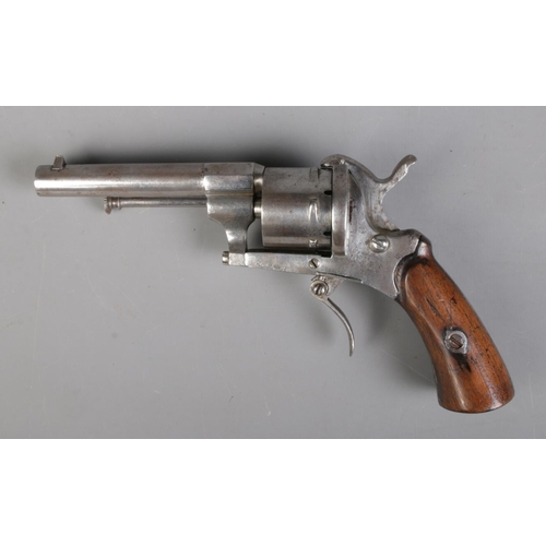 66 - A late 19th century Belgian pin fire revolver. Marked ELG to cylinder. Length 17.5cm. CANNOT POST OV... 