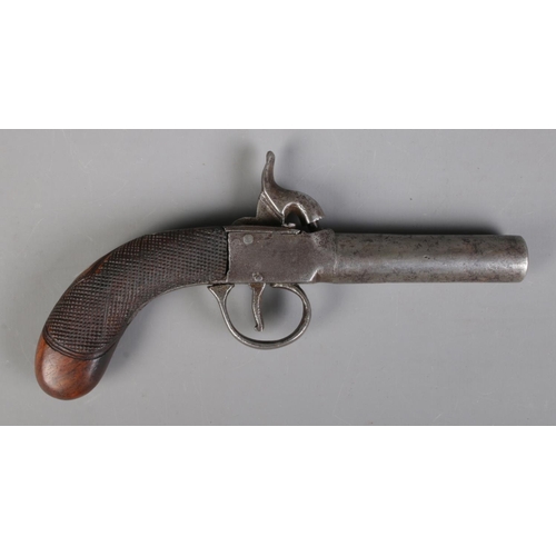 67 - A 19th century percussion cap pistol with screw off cylindrical barrel. Bearing Birmingham proof mar... 