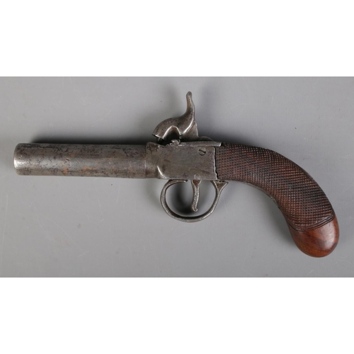 67 - A 19th century percussion cap pistol with screw off cylindrical barrel. Bearing Birmingham proof mar... 