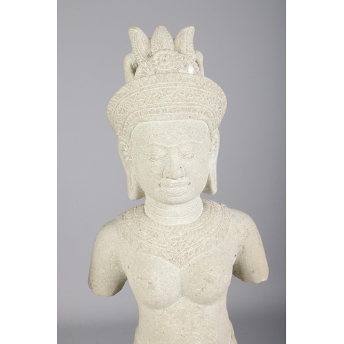 80 - After antiquity, a pair of Khmer style carved stone sculptures, raised on wood plinths. Heights 62cm... 