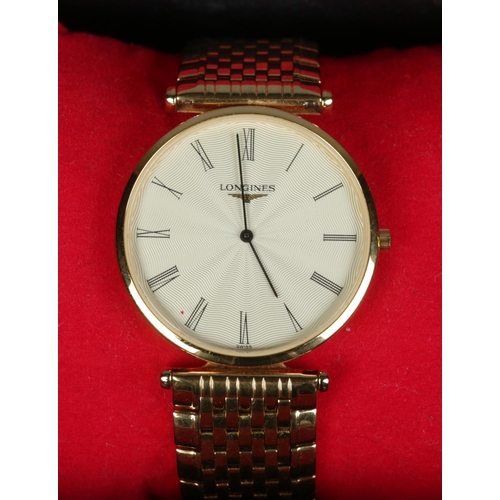 89 - A gents gold plated Longines La Grande Classique quartz wristwatch. With satin dial and Roman numera... 