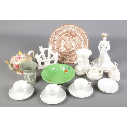 209 - A collection of ceramics. Includes Wagstaff Queen Victoria plate, Coalport Golden Age figure, Lancas... 