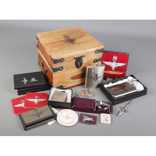 220 - A hardwood box with Parachute Regiment insignia and quantity of related collectables. Includes hip f... 