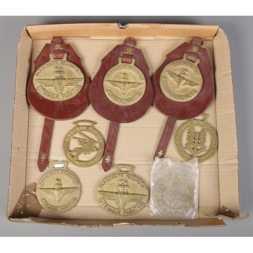 221 - A collection of Parachute Regiment horse brasses.